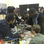 Boys Working at Vex Competition
