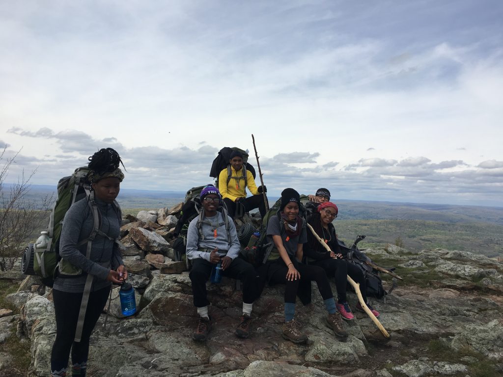 Students on a rock