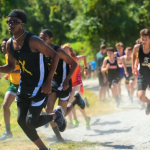Male Track and Field Athletes Running