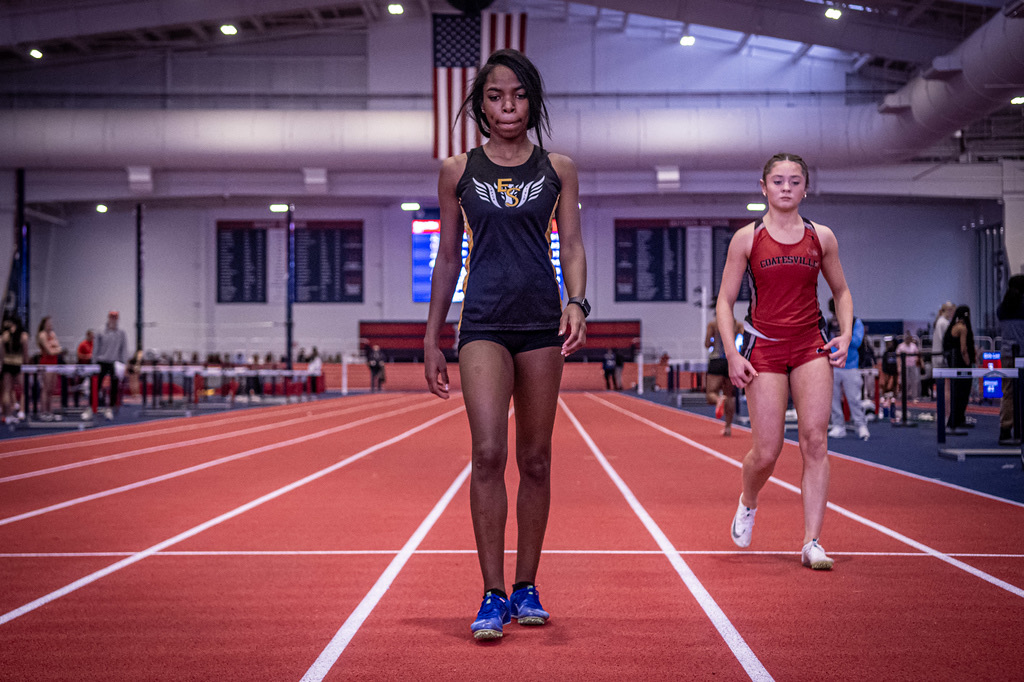 TRACK TEAM BREAKS SCHOOL RECORDS